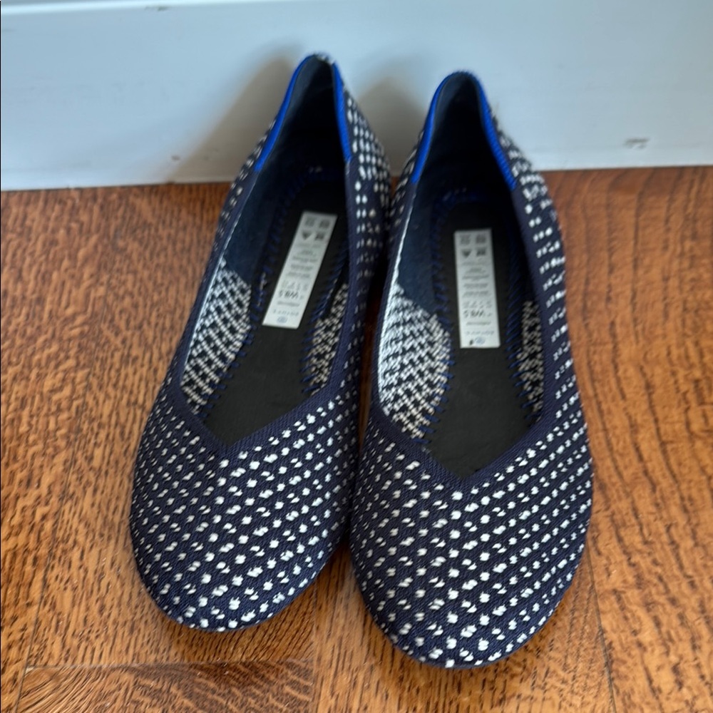 Rothy’s classic navy and white weave flats